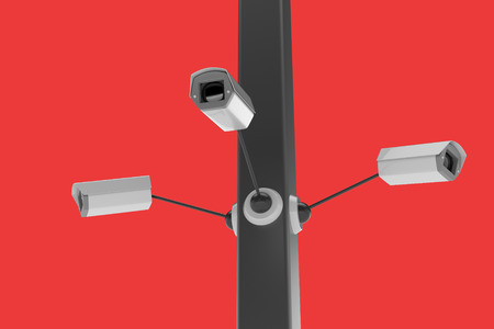 CCTV security camera on red background. 3d illustrationの写真素材