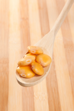 wooden spoon with lupinsの写真素材