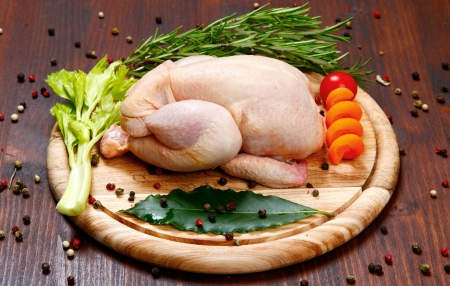 uncooked -raw - chicken with vegetablesの写真素材