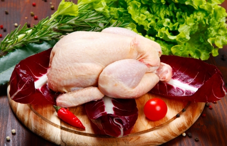 uncooked -raw - chicken with vegetablesの写真素材
