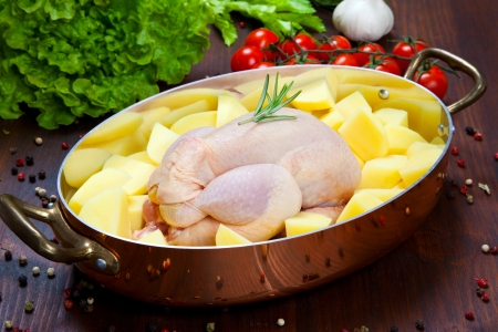 Raw - uncooked - chicken with vegetablesの写真素材