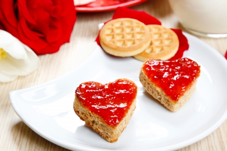 a sweet breackfast with love and red hearths of jamの写真素材