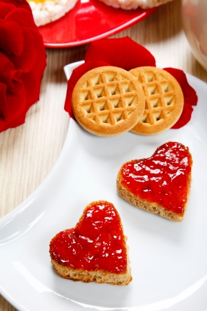 a sweet breackfast with love and red hearths of jamの写真素材