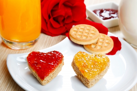 a sweet breackfast with love and red hearths of jamの写真素材