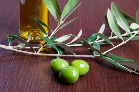 Green olives and oilの写真素材