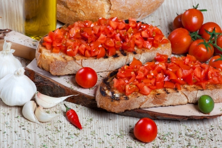 Italian bruschetta with tomatoes, oil and breadの写真素材