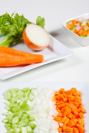 Fresh and natural food, celery, carrots, onion and vegetables on a dishの写真素材