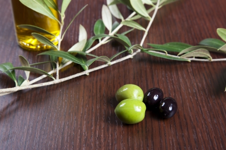 Green olives and oilの写真素材