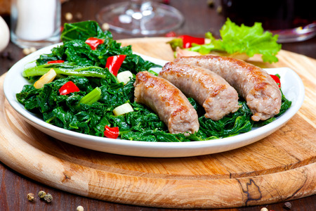 Sausages with vegetable garnish, cime di rapaの写真素材