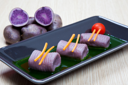 Potato dumplings with red wineの写真素材