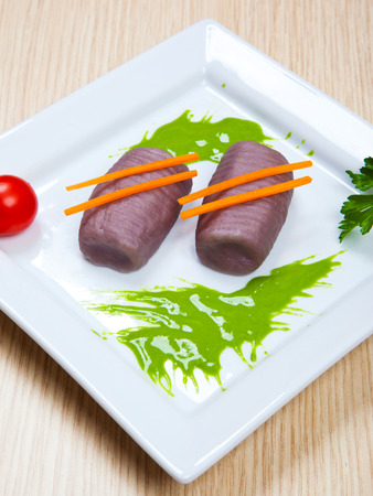 Potato dumplings with red wineの写真素材