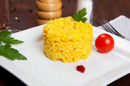 risotto with saffron on a dishの写真素材