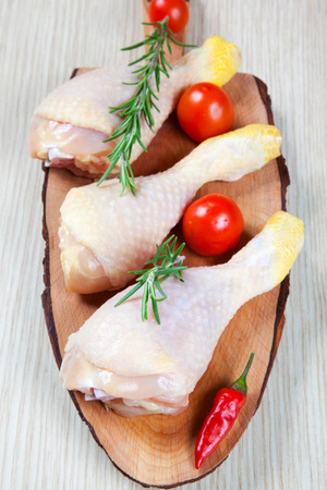 uncooked chicken thigh -raw - chicken with vegetablesの写真素材