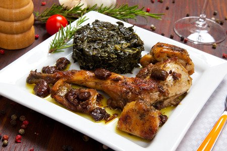 rabbit meat with vegetables in a dishの写真素材