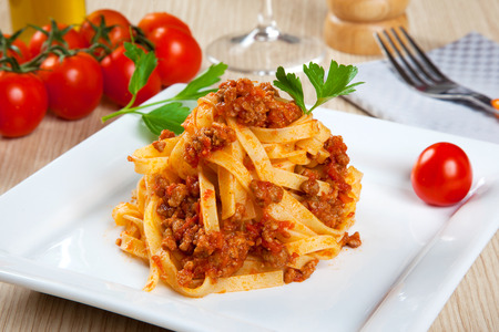 Noodels with meat sauce in a dishの写真素材