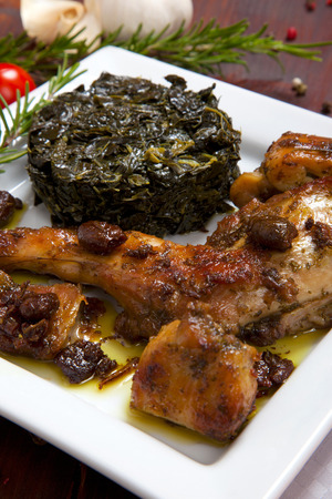 rabbit meat with vegetables in a dishの写真素材