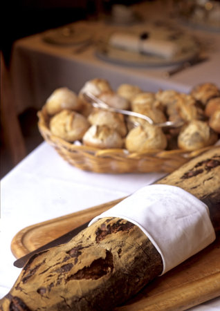 a loaf of bread presented along with bread roll