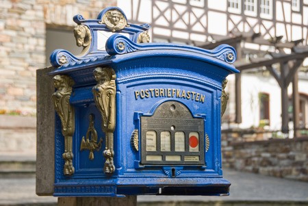 Old blue postbox still in use.の写真素材