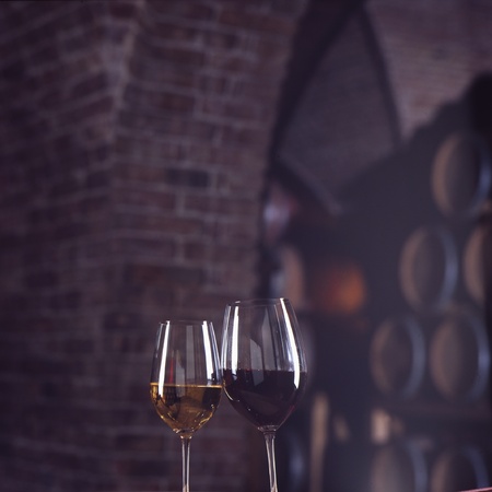 glasses of red and white wineの写真素材