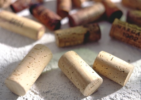corks on a white stone undergroundの写真素材