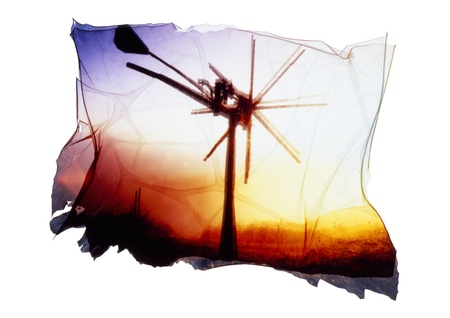 wind engine in sunset, presented in an artistic wayの写真素材