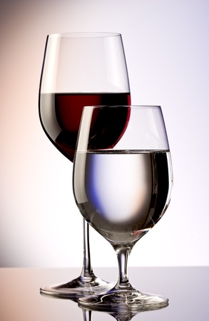 glasses of red wine and waterの写真素材