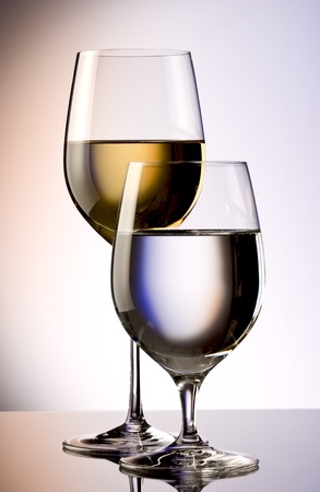 glasses of white wine and waterの写真素材