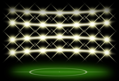 Football field in dark with spotlight background.の写真素材