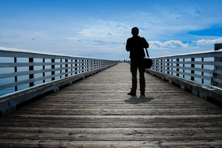 Man looking at open ocean vista.