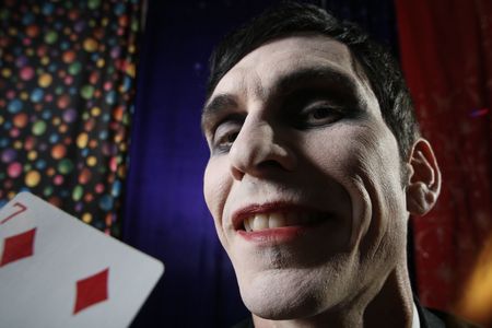 Smiling Joker face. Dramatic light.の写真素材