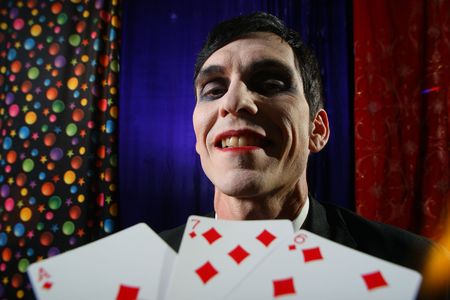 Smiling Joker face. Dramatic light.の写真素材