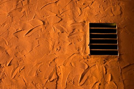 Stucco Wall With A Window Detail. Texture Background.の写真素材