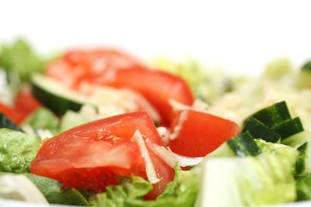 Fresh salad, macro close-up isolated on whiteの写真素材