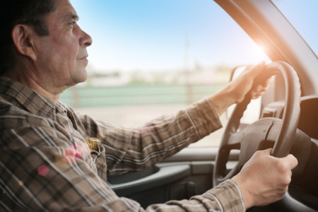 Man driving van or SUV.