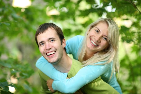 Happy couple outdoorsの写真素材