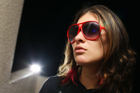 Young woman playing rockstar personality