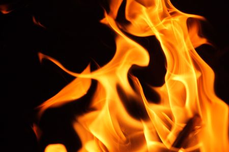 Fire flames over black backgroundの写真素材