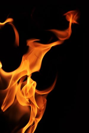 Fire flames texture over black background の写真素材