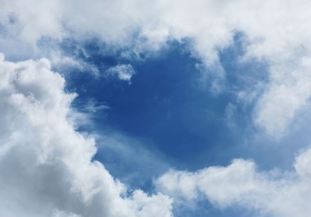 Frame of white clouds over beautiful blue sky の写真素材