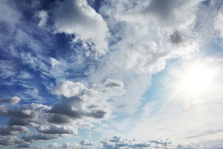 Beautiful white clouds over blue sky の写真素材