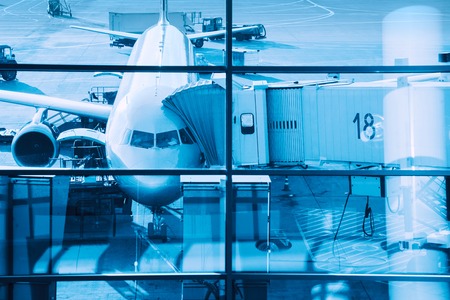 Airplane plane at terminal gate ready for boarding.の写真素材
