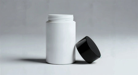 White plastic jar with black cap on white background, 3d renderの素材
