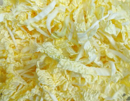 Asian white cabbage texture, chopped or sliced vegetables background, close up top viewの写真素材