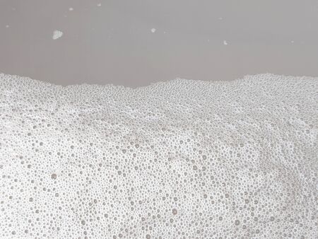Abstract white soapy foam texture backgroundの写真素材