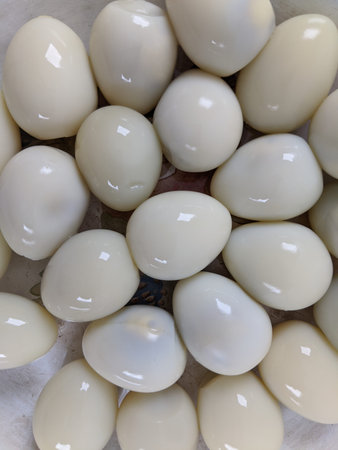 The texture of the peeled quail eggs, ready to cook