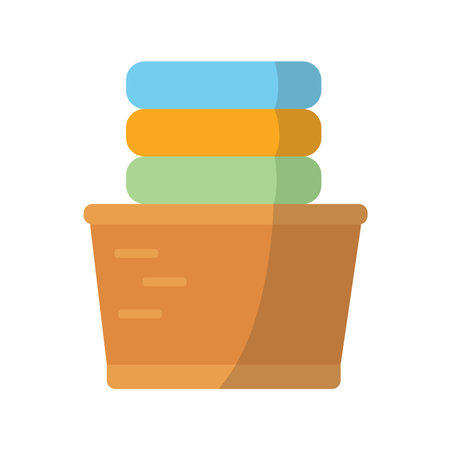 Dry clothes in basket, flat icon cartoon, clean clothes in the laundry basket, vector illustration isolated on white backgroundのイラスト素材