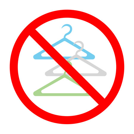 Forbidden sign with clothes hangers icon, no clothes hangers allowed sign, laundry hanger prohibition sign, do not use clothes hanger symbolのイラスト素材