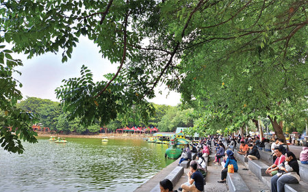 Unidentified people visit lakeの写真素材