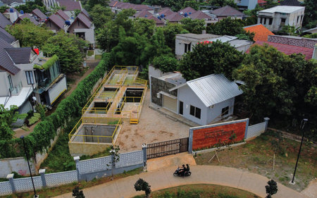 Unidentified people visit the construction site.の写真素材