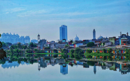 Cityscape with reflection in the river